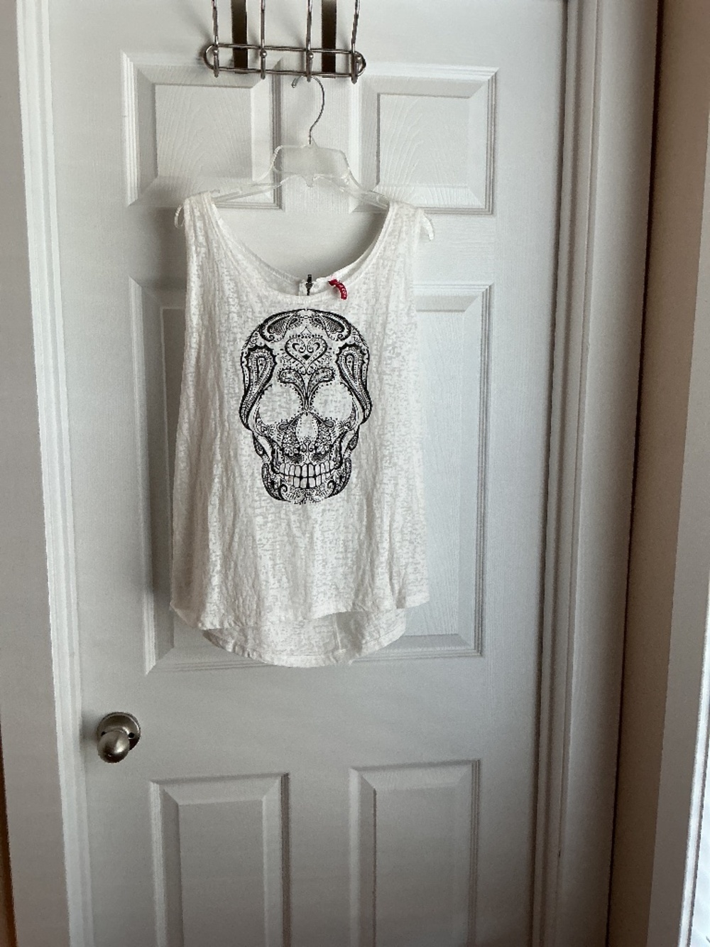 White burn out style tank top with a black skull